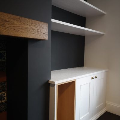 Oak lined alcove unit with  open log store